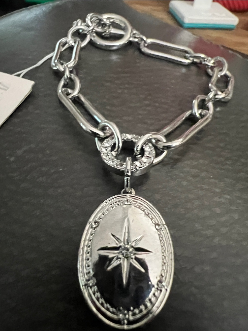 Silver Northstar Link bracelet-also has a locket for pictures.